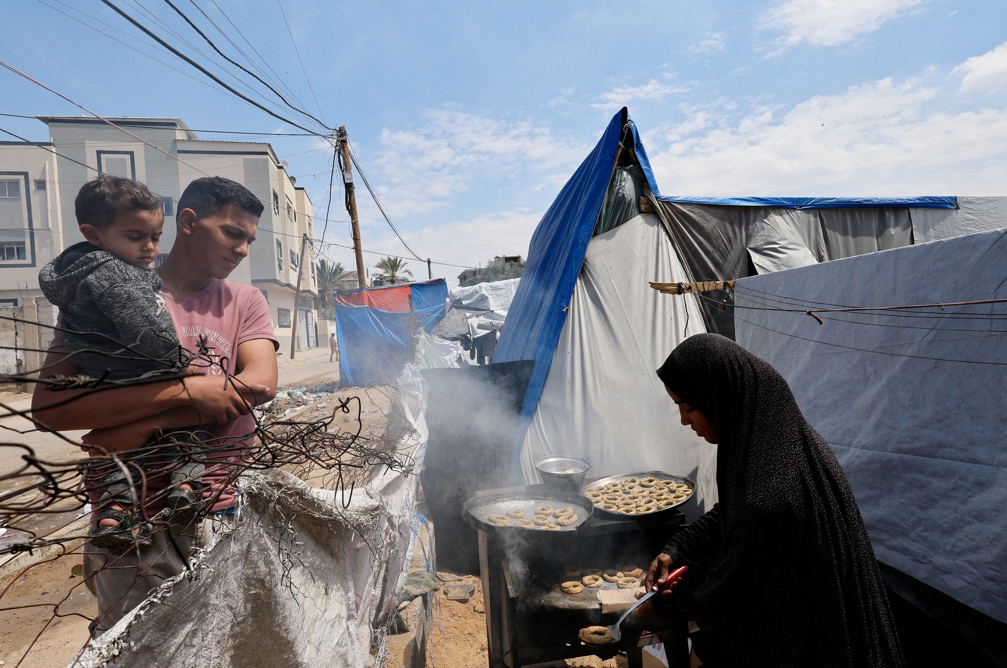 Palestinian family making traditional pastries